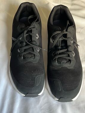 Reebok Men's Black Athletic Running Shoes with White Soles.